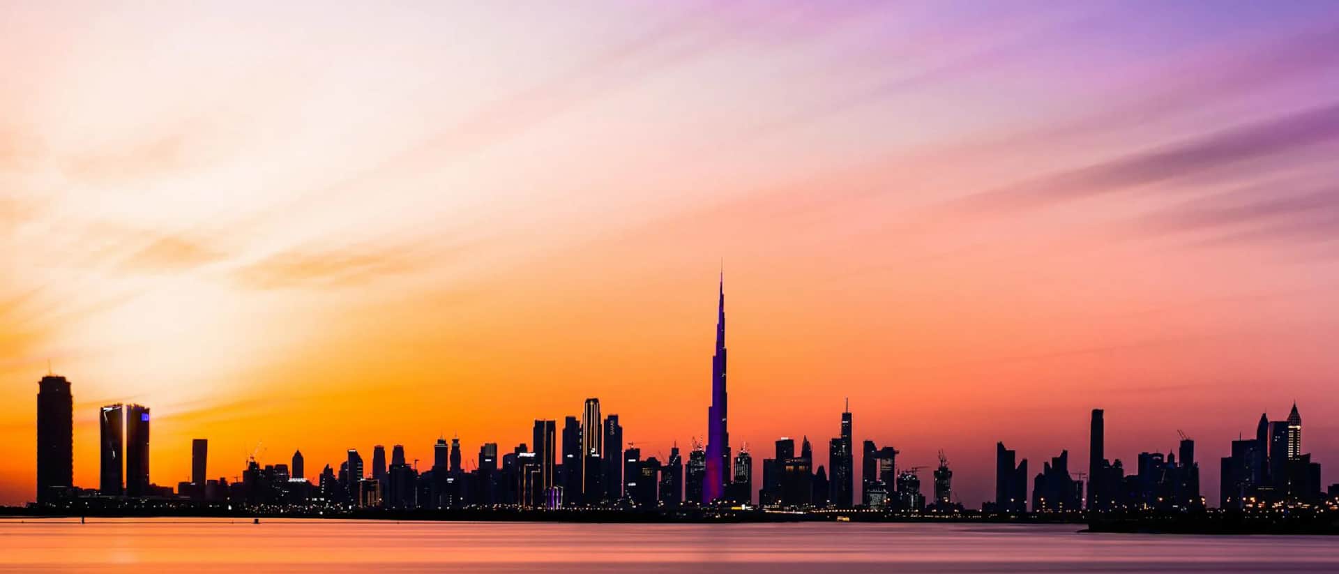 Dubai skyline with Burj Khalifa at sunset