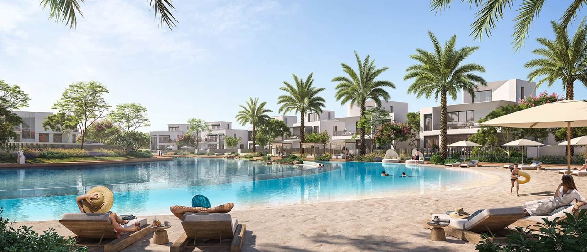 Luxury villas with a resort-style pool and sandy beach
