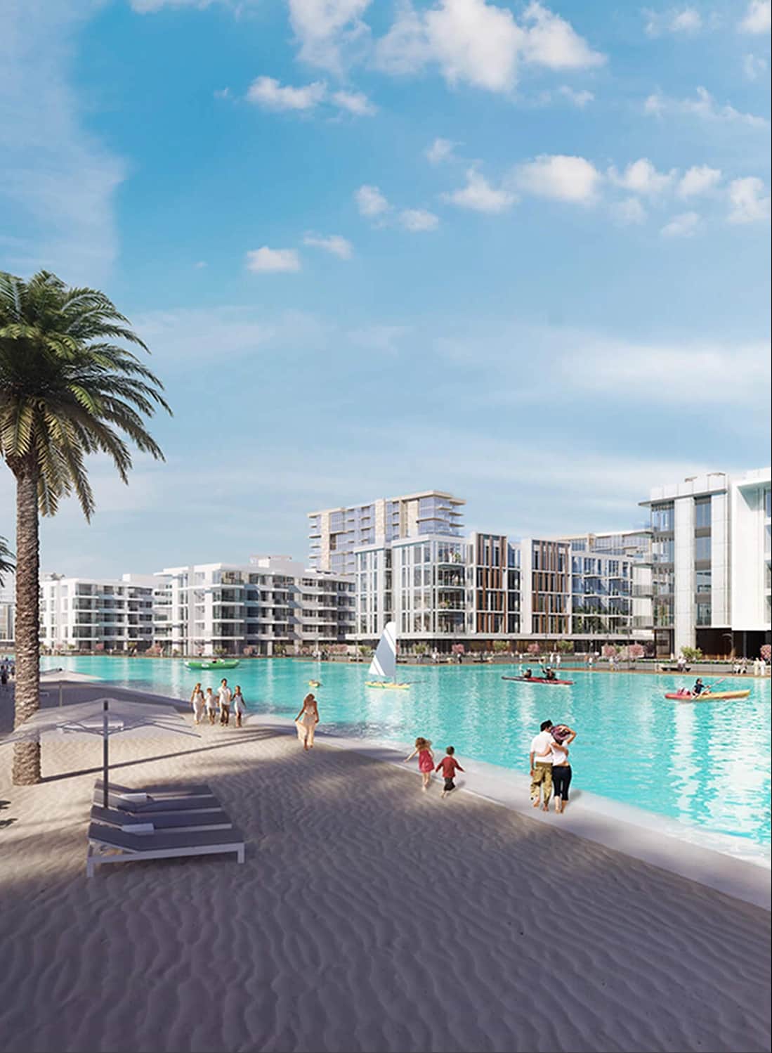 Seaside promenade with paths, fountains, and buildings