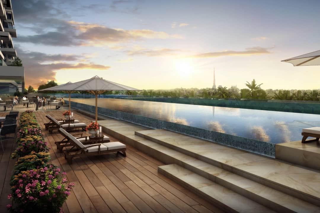 Luxury poolside with loungers and sunset view
