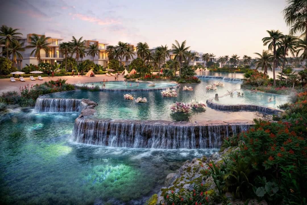 A serene resort with cascading waterfalls and lush greenery