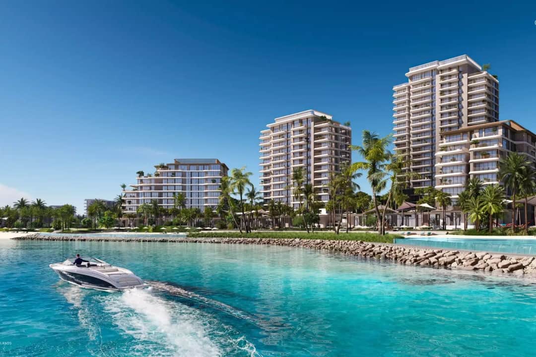 Luxury waterfront residences with boat on turquoise water
