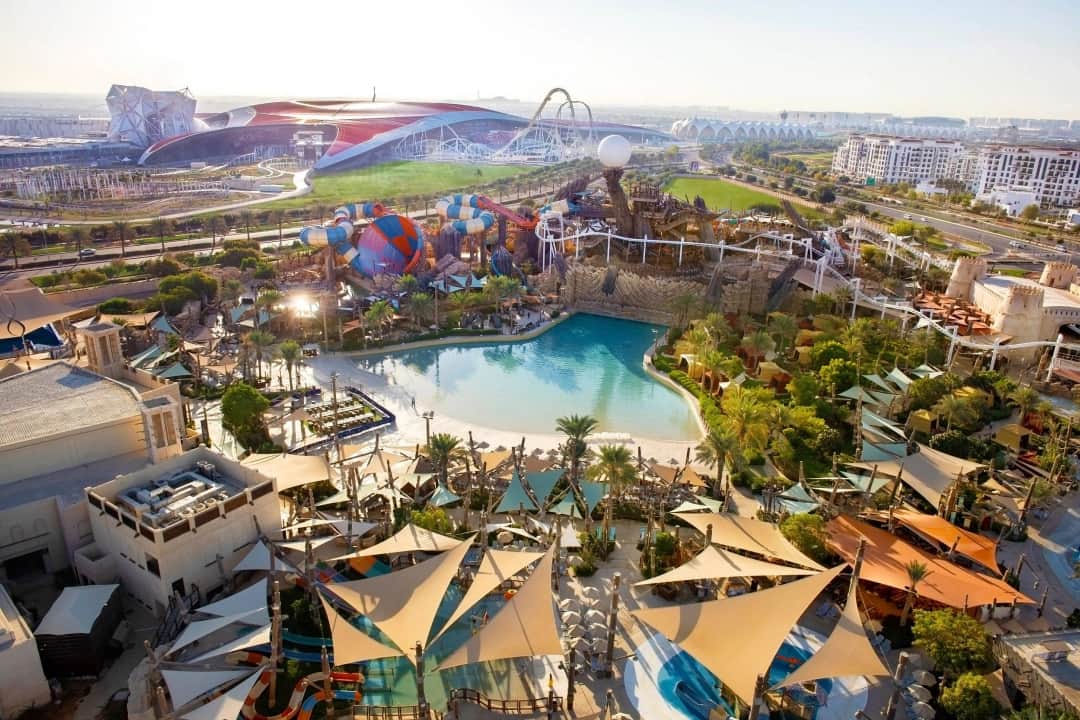 Aerial view of vibrant water park with slides and pools