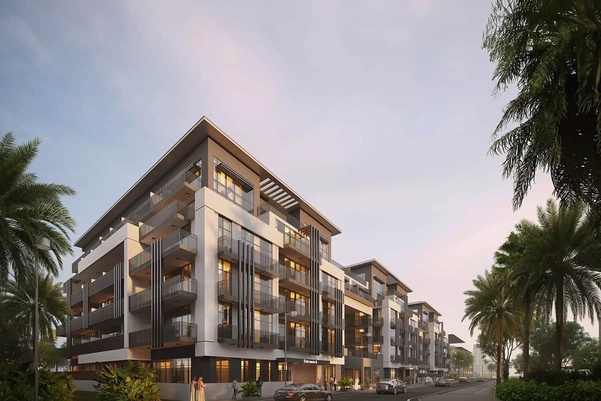Contemporary apartment complex with lush surroundings