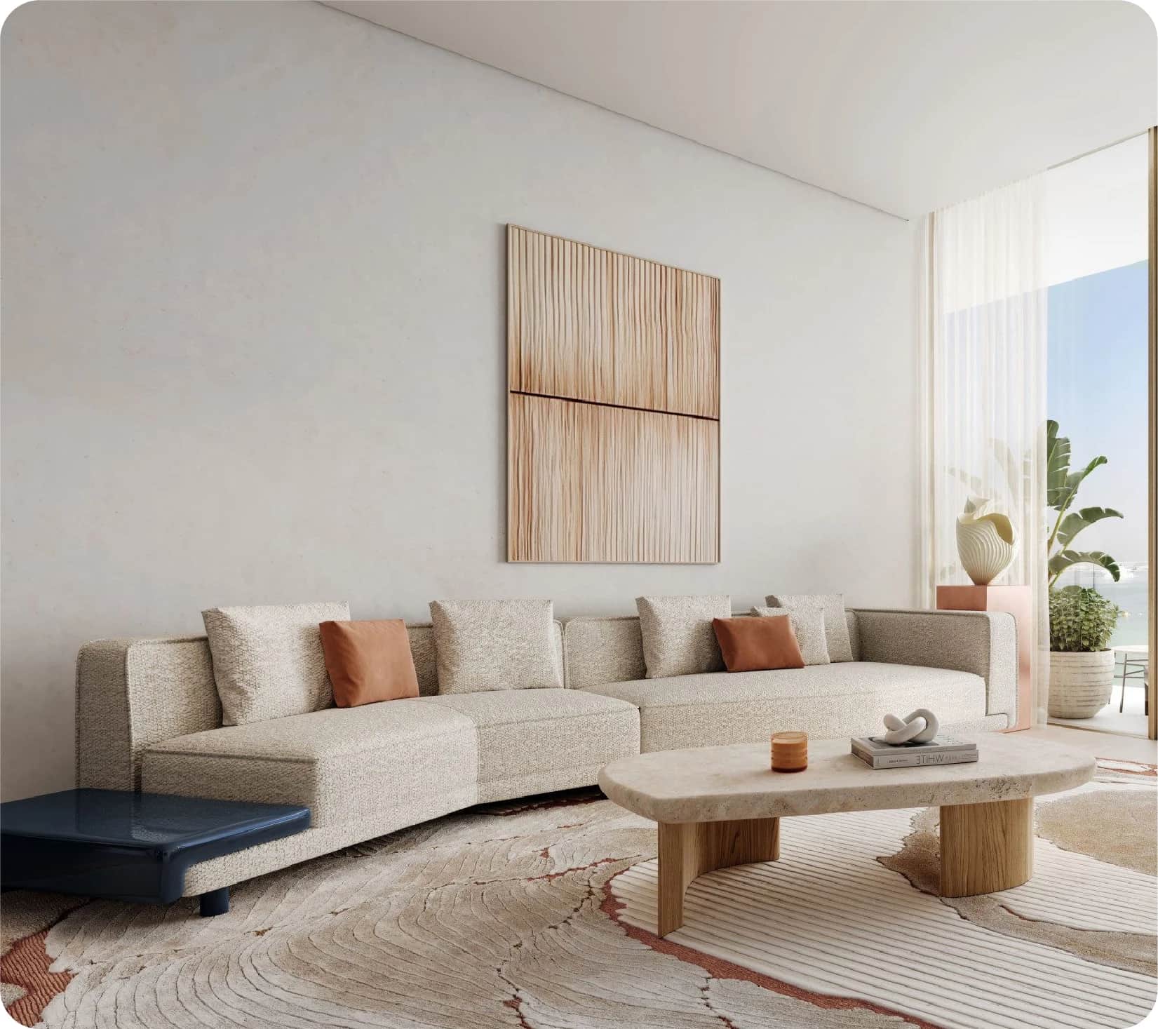 Bright, minimalist living room with a large sofa