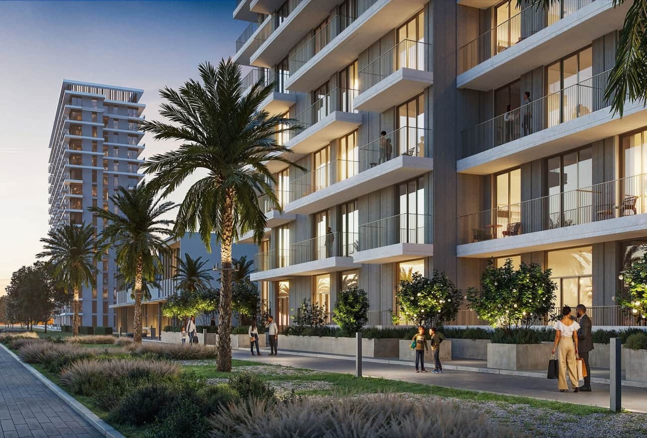 Residential building with palm trees and people walking