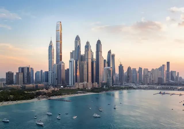 Dubai Marina skyline at sunset with Six Senses Residences