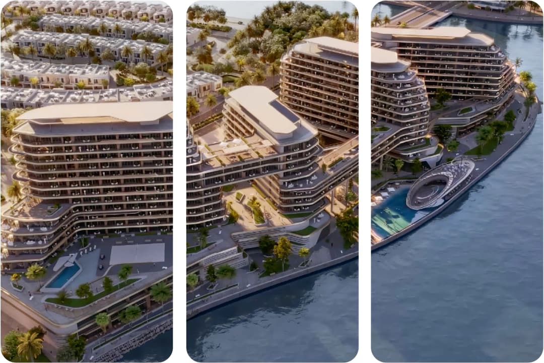 Aerial view of a modern waterfront building with pools and luxury amenities