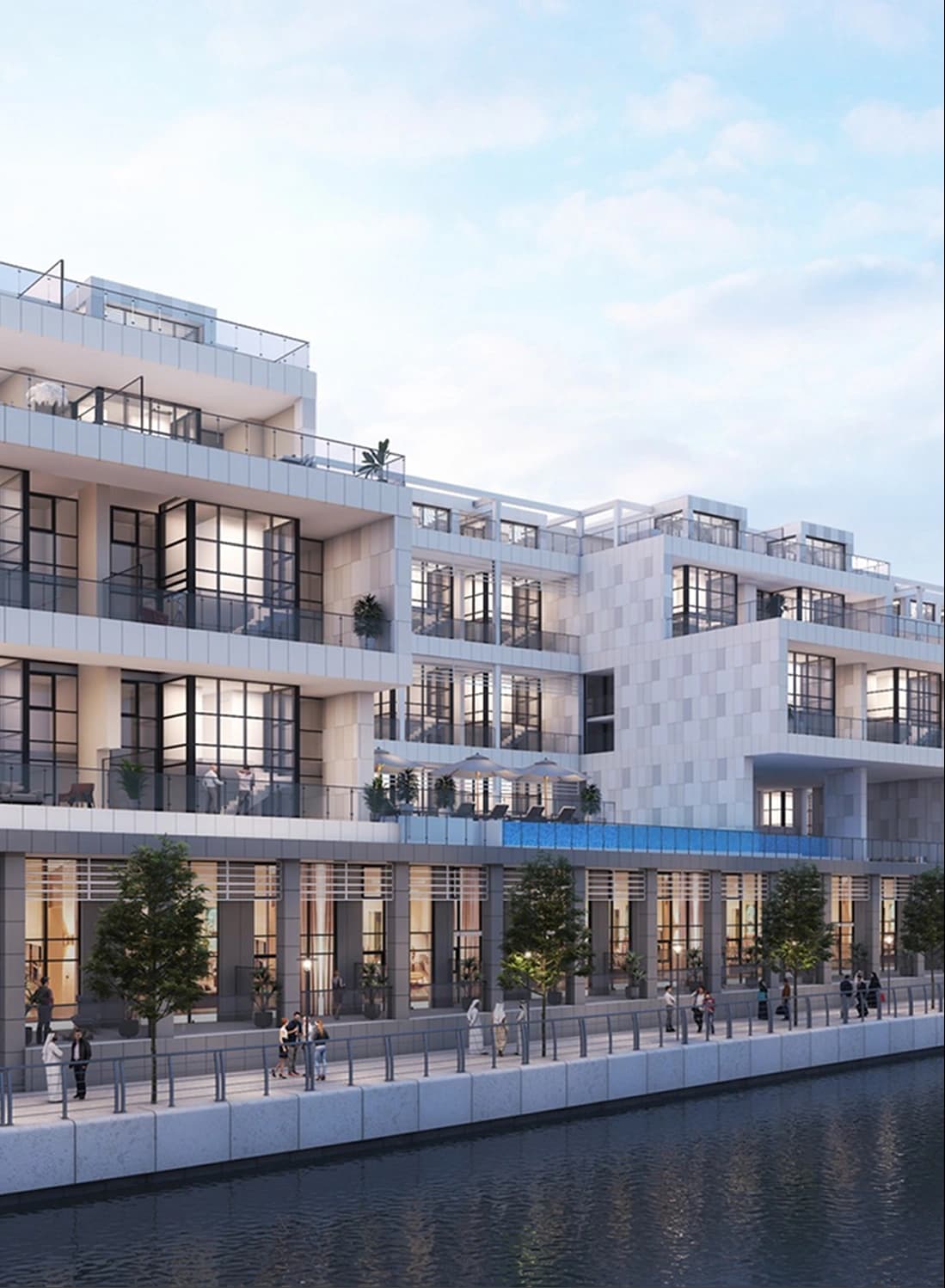 Modern office building with sleek design by the water