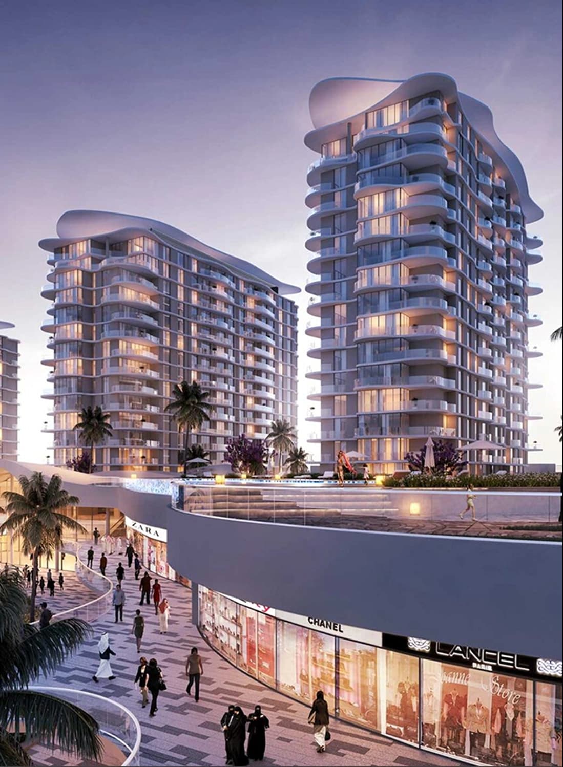 Modern apartment buildings with upscale shopping district at sunset
