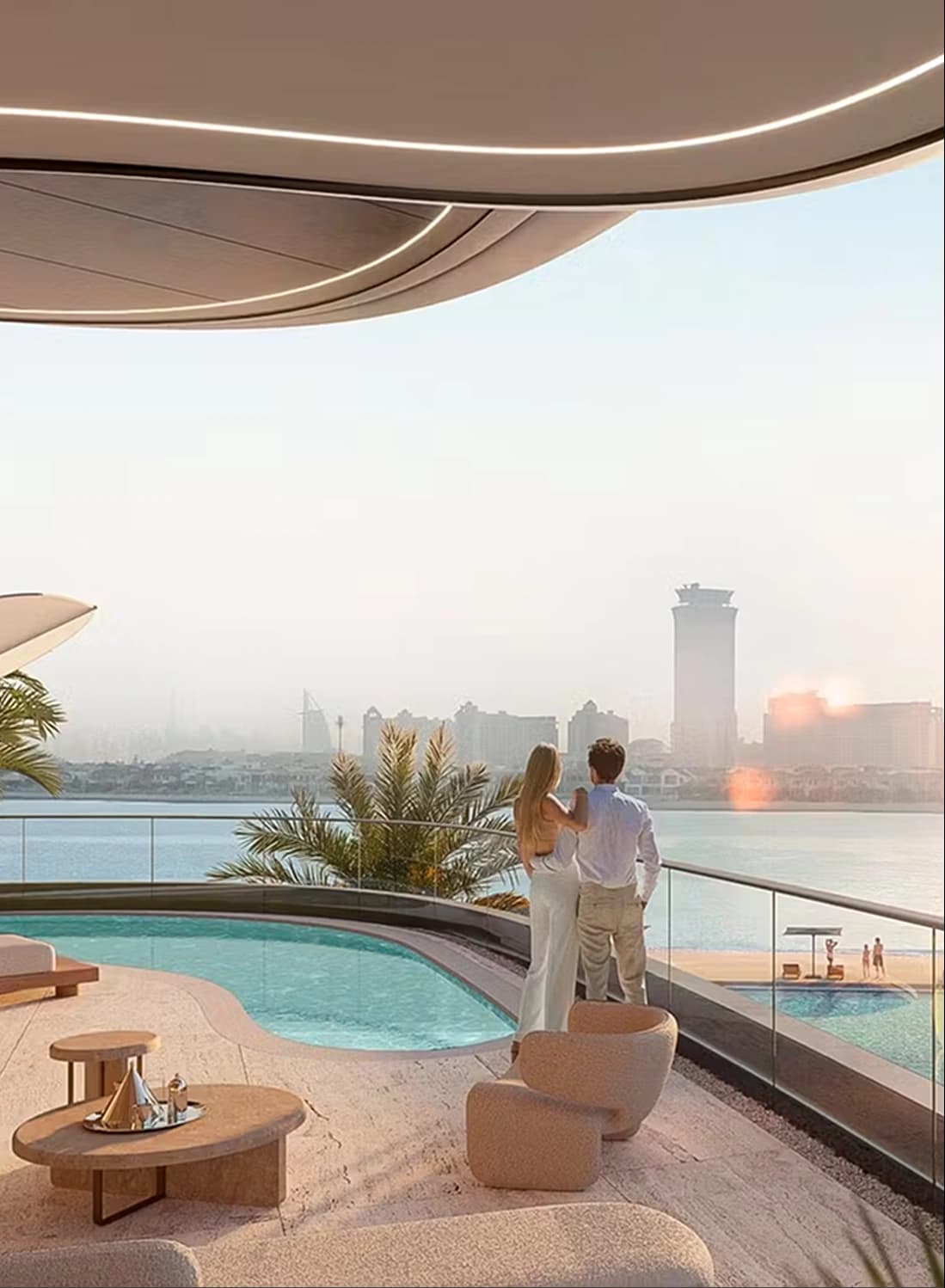 Couple enjoying a balcony view with pool and cityscape