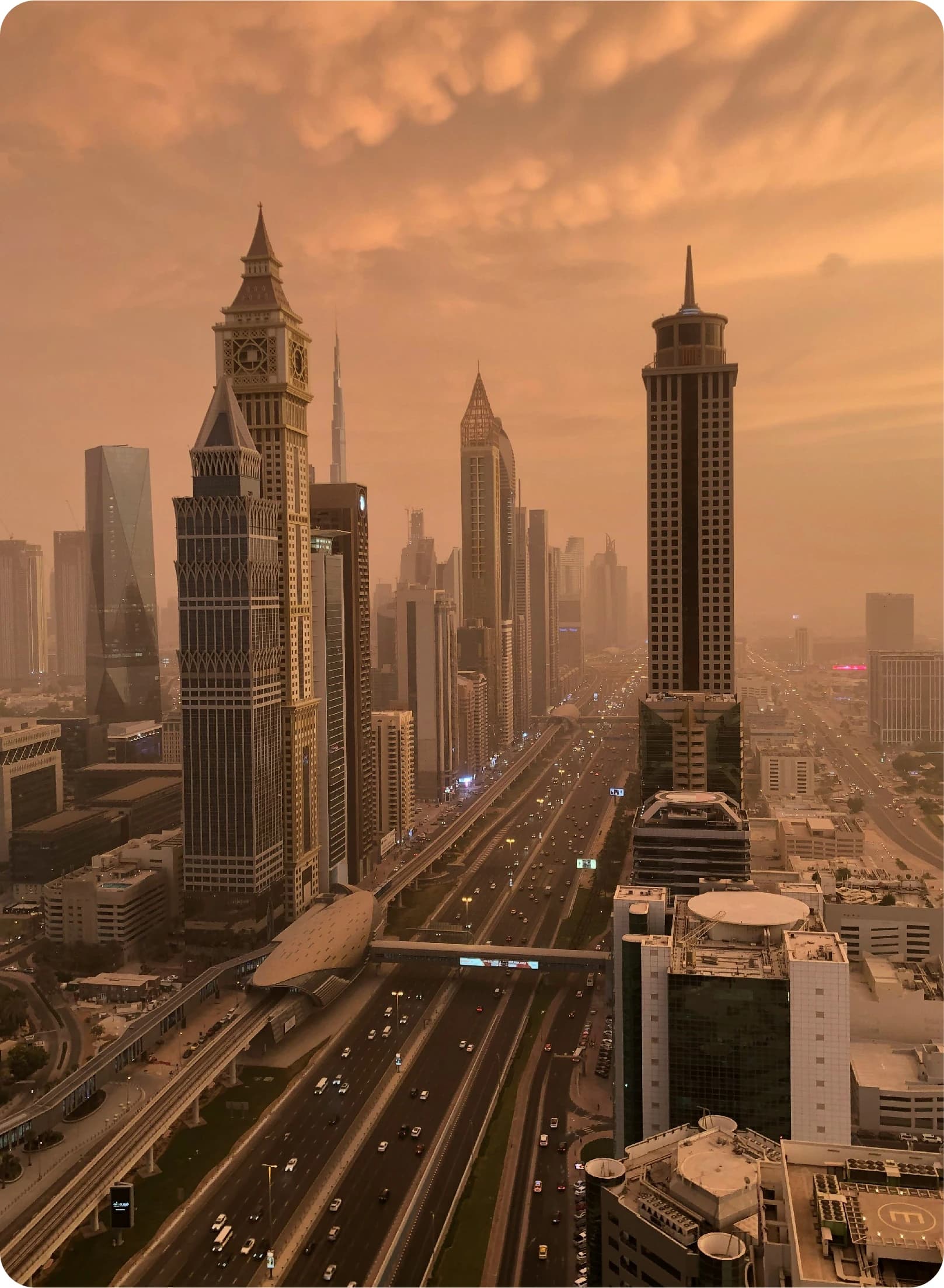View of Sheikh Zayed Road with skyscrapers at sunset