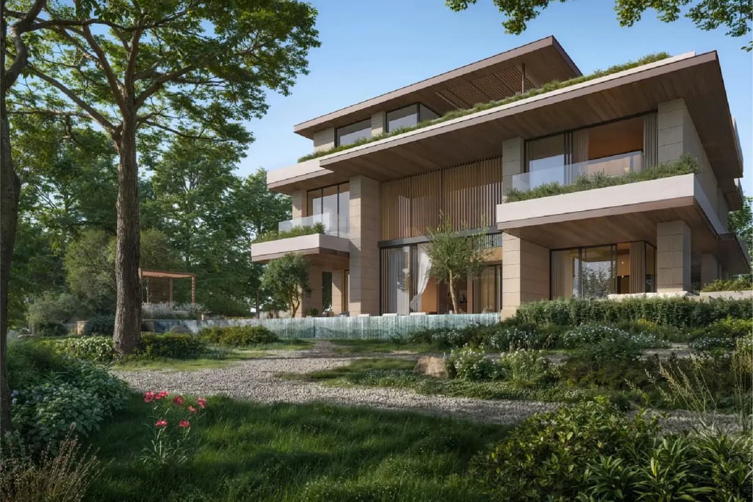 Modern villa surrounded by lush greenery and trees