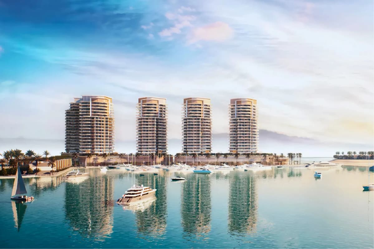 Luxury waterfront towers with yachts and marina views