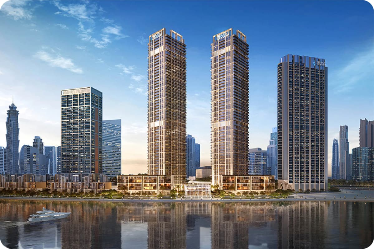 Luxury waterfront towers with yachts and cityscape views