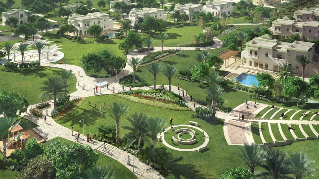 Aerial view of a landscaped park with pathways and green spaces