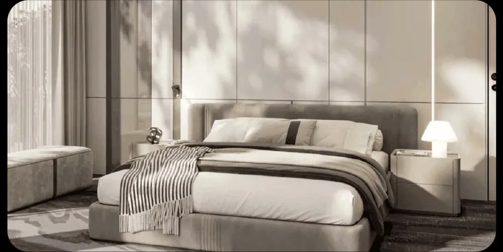 Modern bedroom with neutral tones and soft lighting