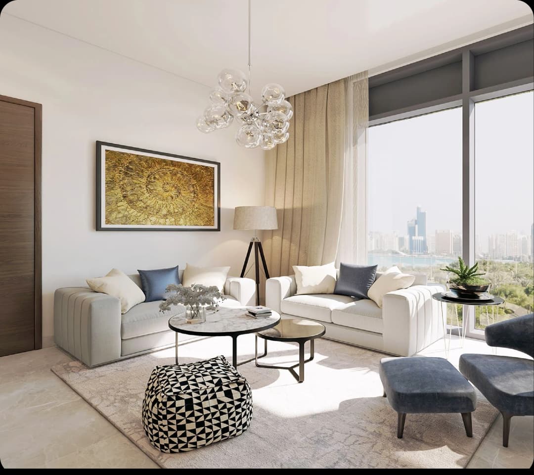Modern living room with city and water views