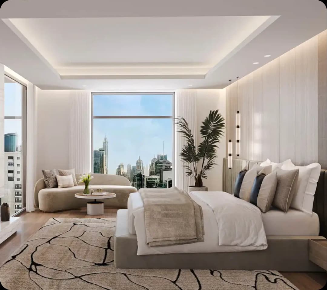 Modern bedroom with a large window overlooking a city