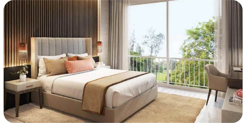 A cozy bedroom with a large window and soft lighting