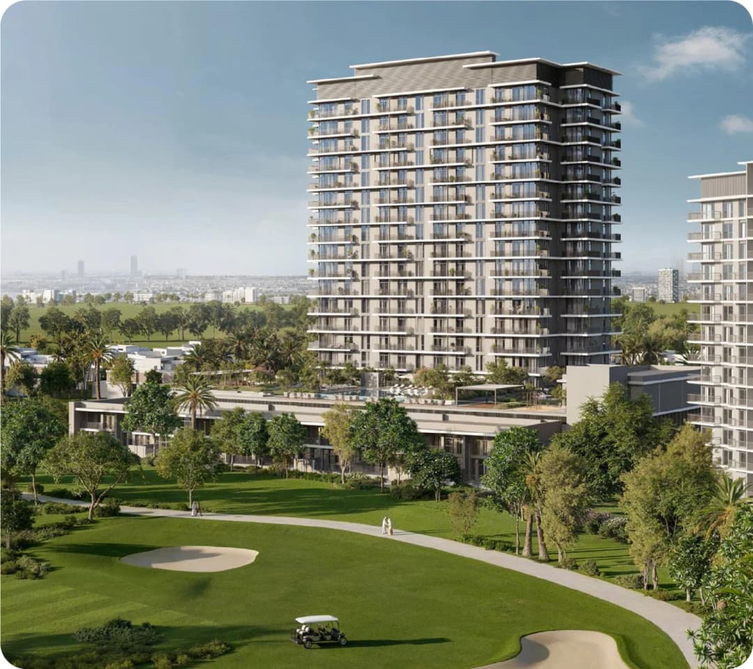 View of golf course with palm trees and residential buildings
