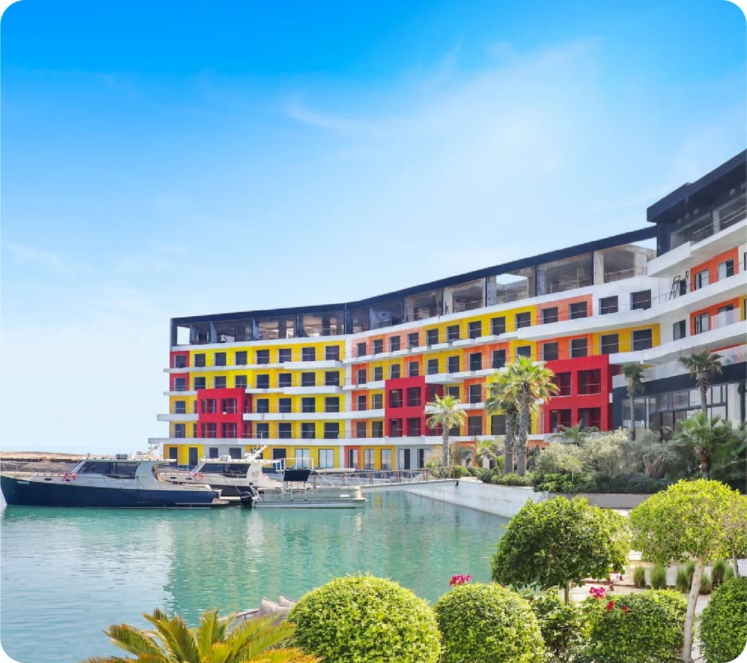 Luxury residential complex with pool overlooking ocean