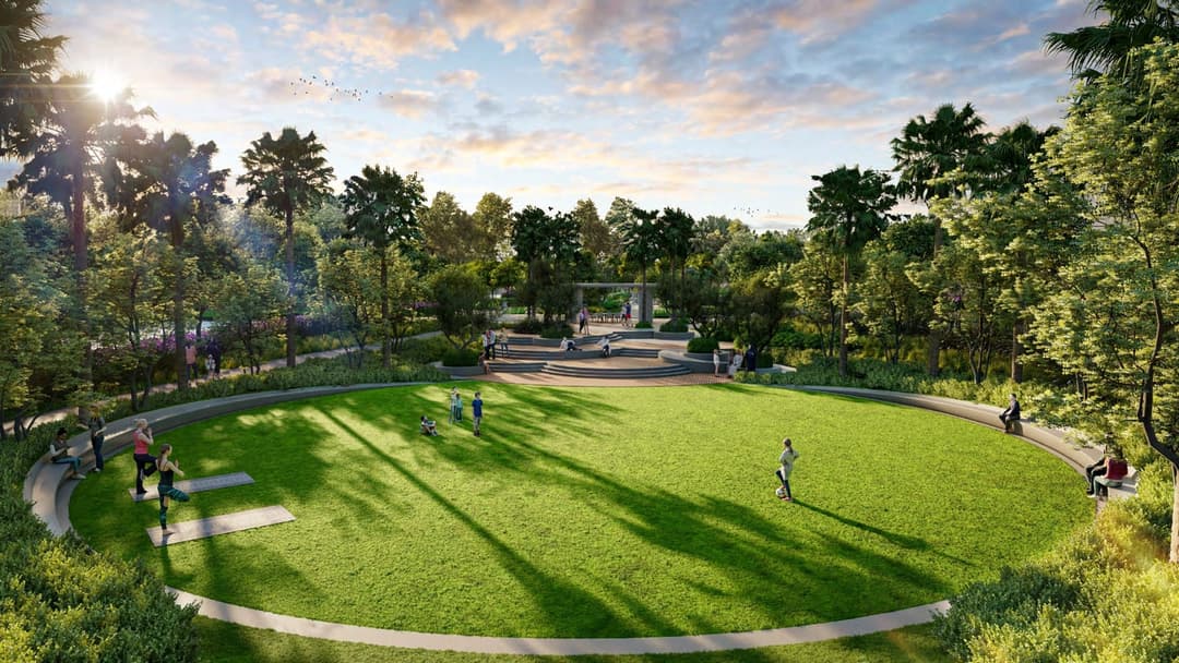 Lush green park with people enjoying outdoor activities