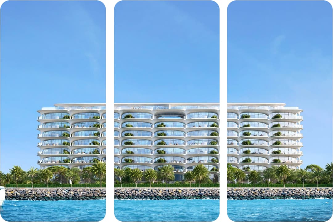 Modern waterfront building with balconies and palm trees