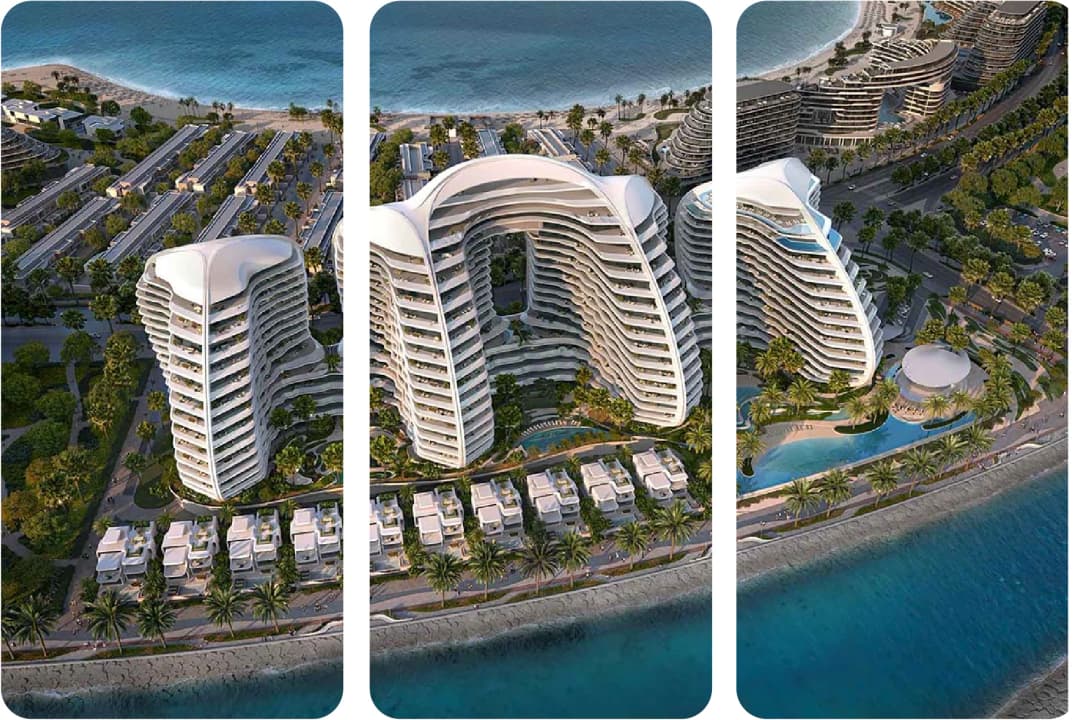 Aerial view of modern beachside residential towers with pools