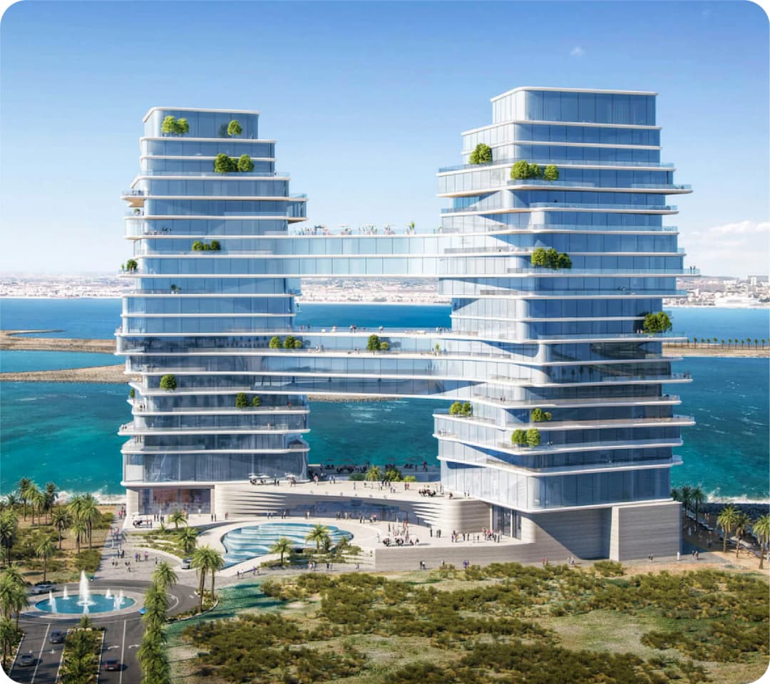 Luxury waterfront apartment complex with pools and greenery