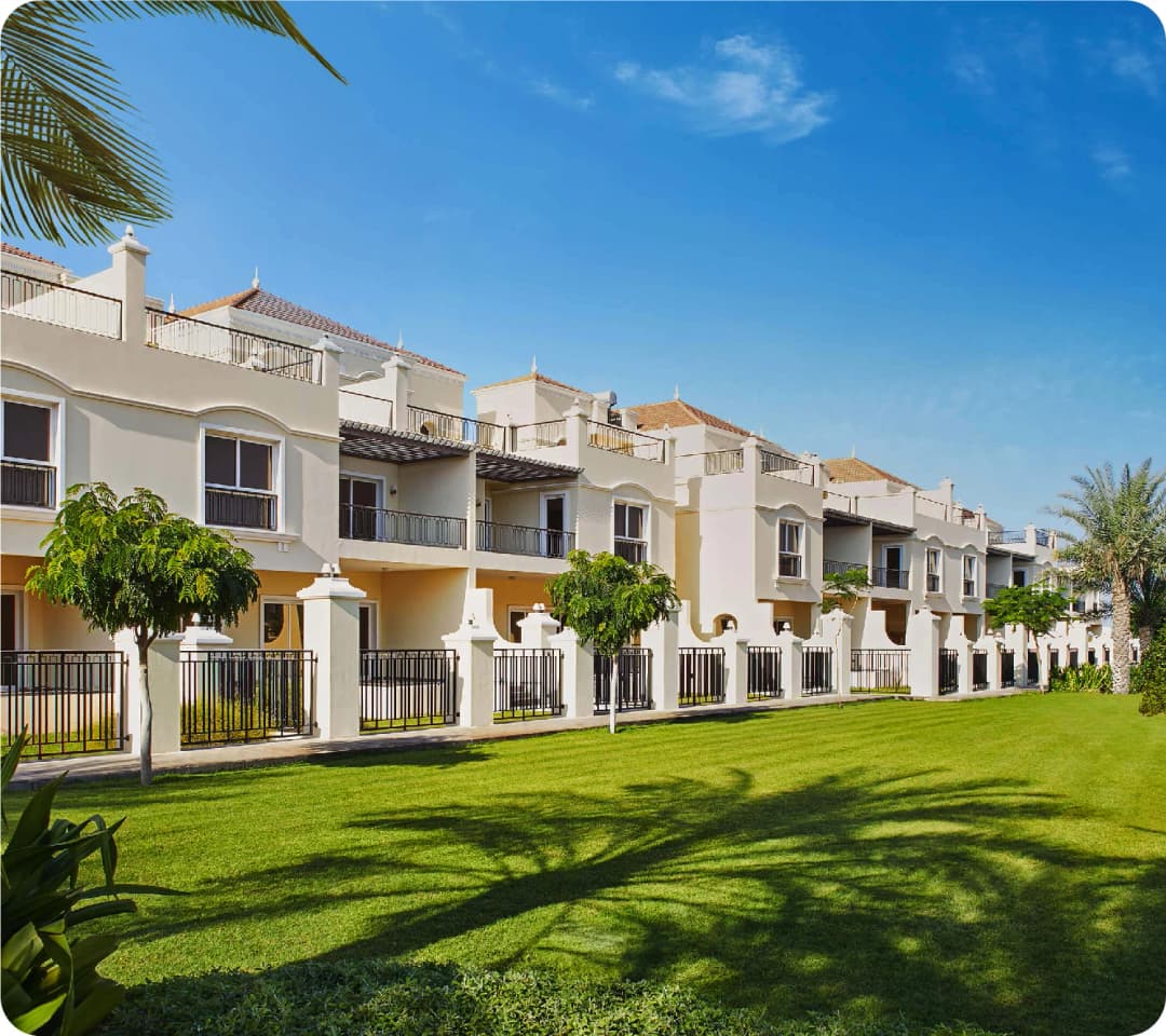 Modern townhouses with lush green landscaping