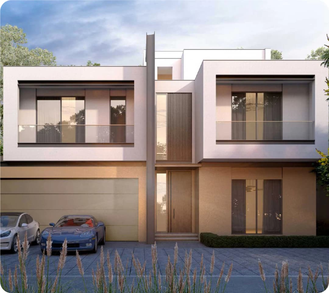 Scenic waterfront view with lush greenery and modern villas