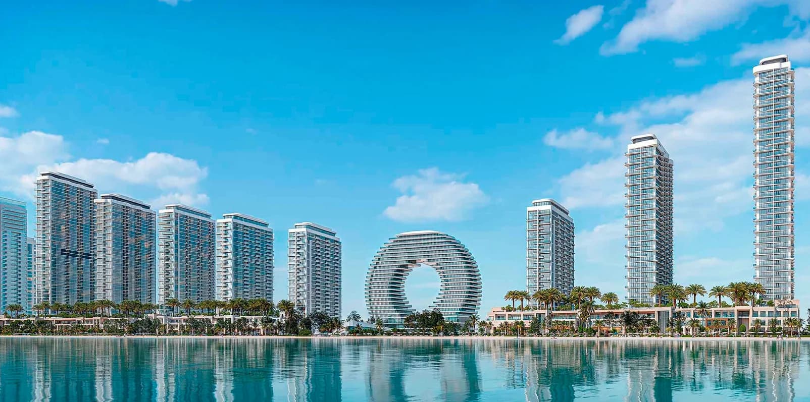 Aerial view of luxurious waterfront development with yachts