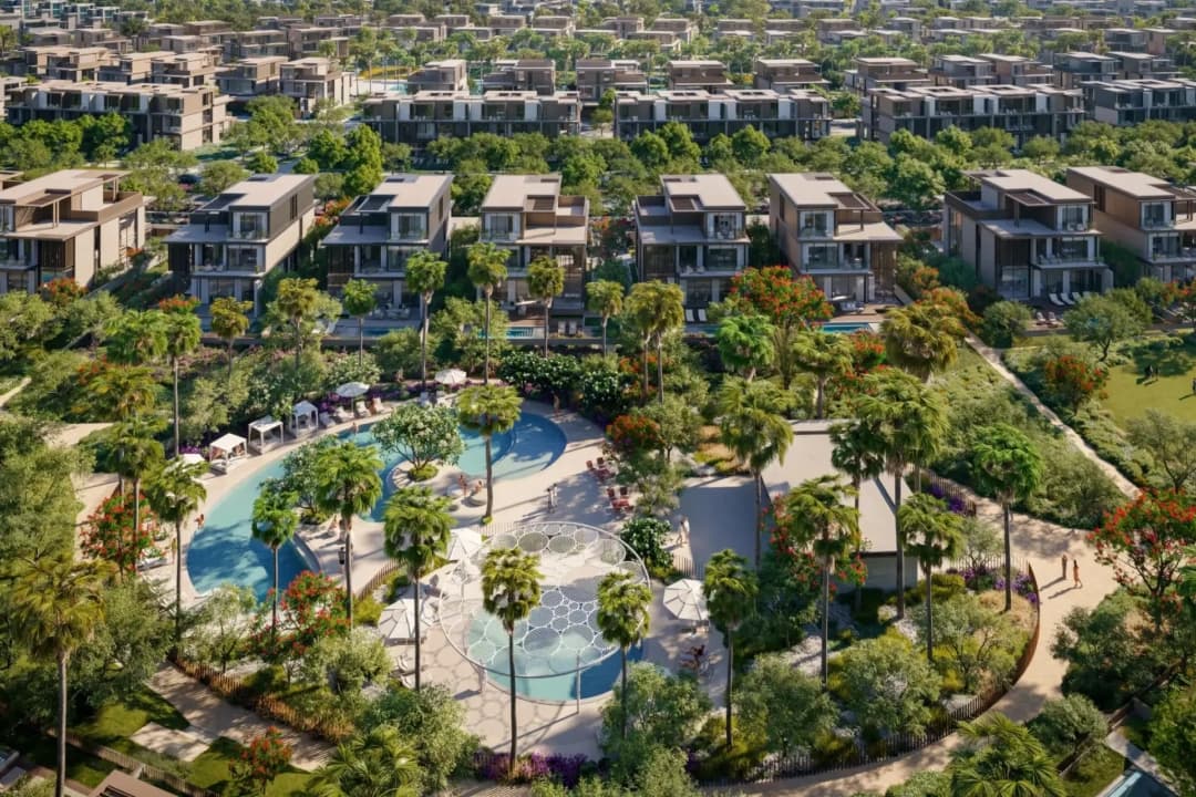 Aerial view of resort-like community with villas and pools