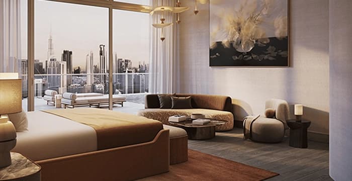 Elegant bedroom with luxurious seating and city views