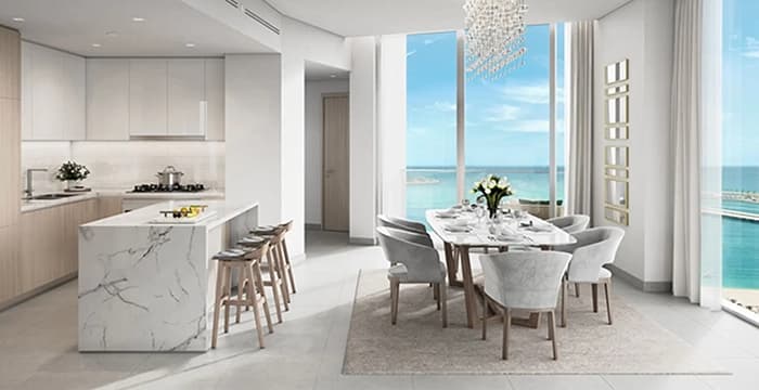 Modern kitchen and dining area with a scenic ocean view