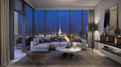 Elegant living room with a view of Burj Khalifa at night