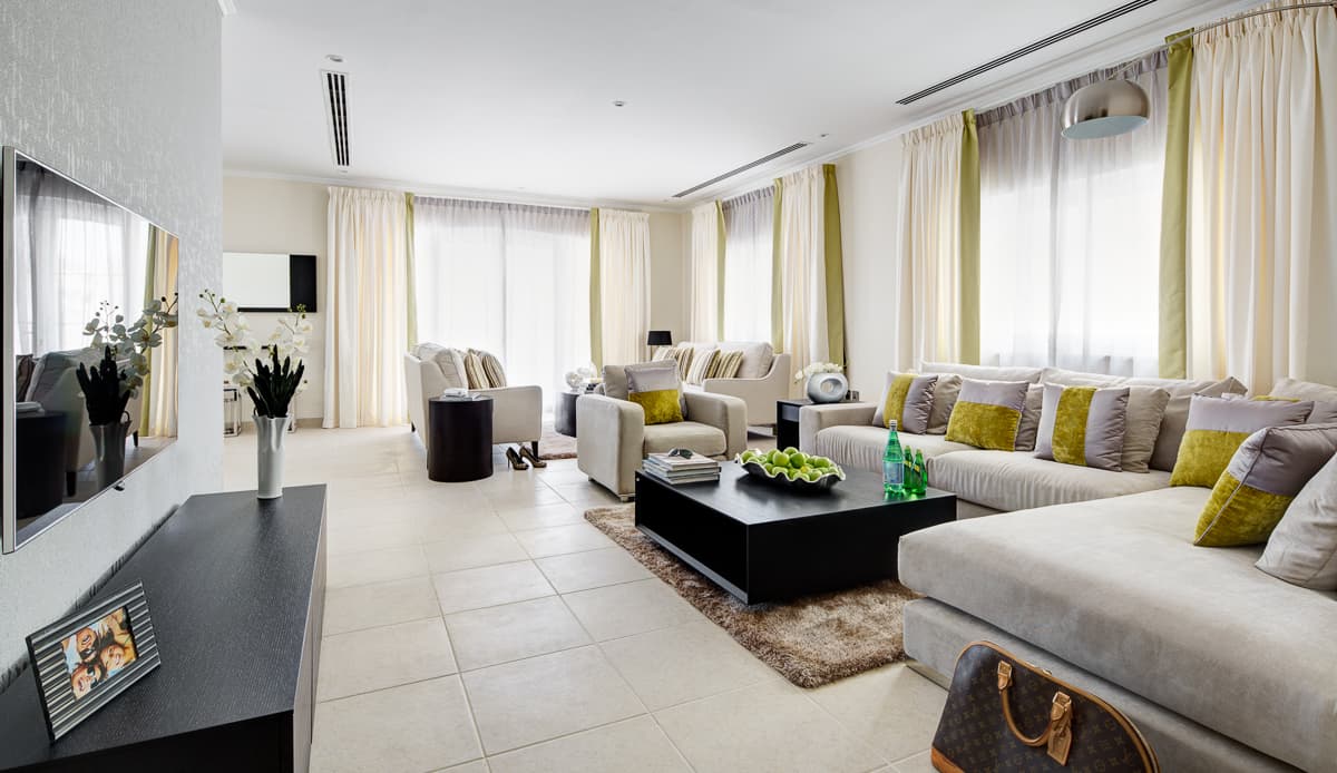 Comfortable living room with ample seating and natural light