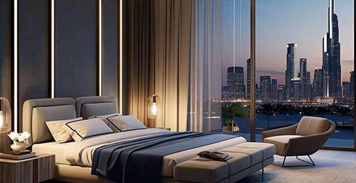 Bedroom with city skyline view at sunset and interior