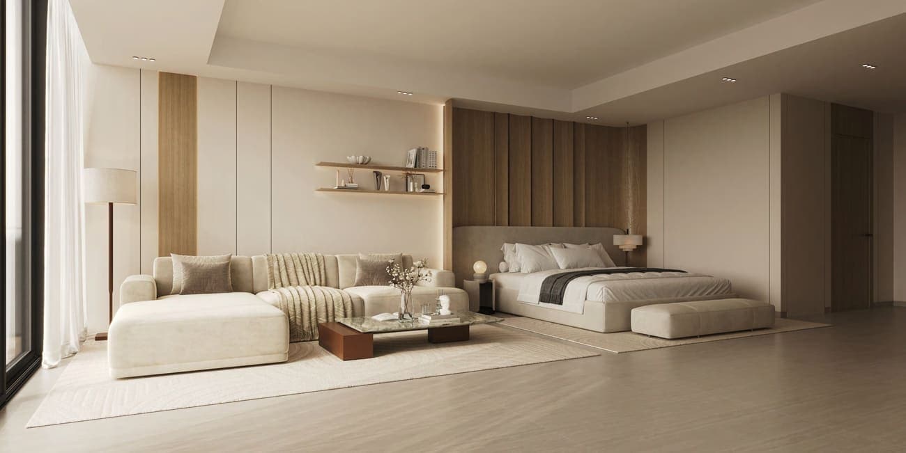 Bright bedroom with sofa and soft tones
