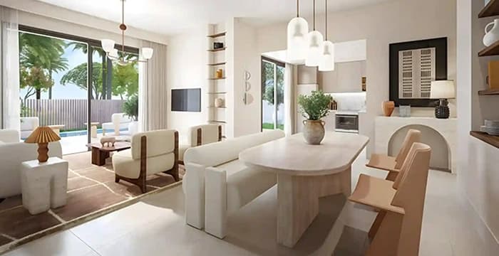 Modern living and dining area with natural light and pool view