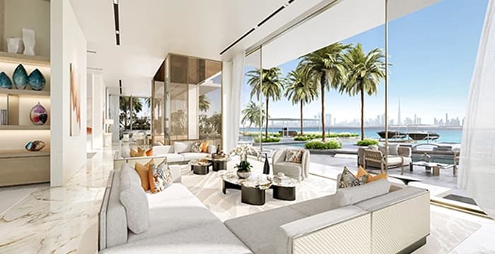 Spacious living room with panoramic windows and waterfront view