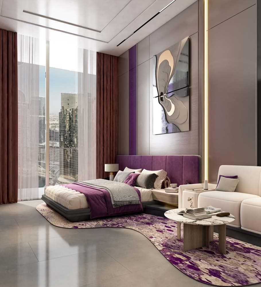 Sleek bedroom with purple accents and city skyline view