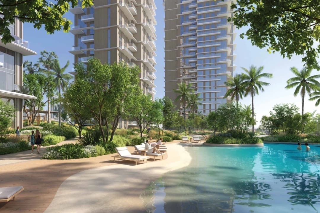 Serene poolside with lounge chairs and gardens