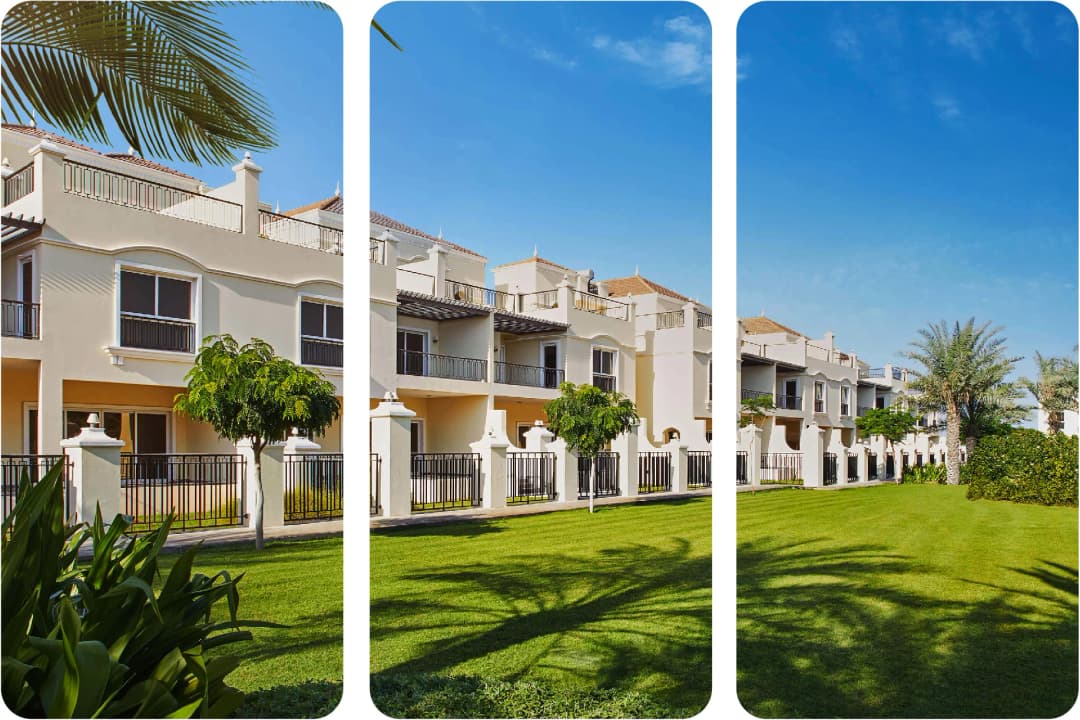 صف من المنازل المتلاصقة مع مناظر طبيعية خضراء مورقة