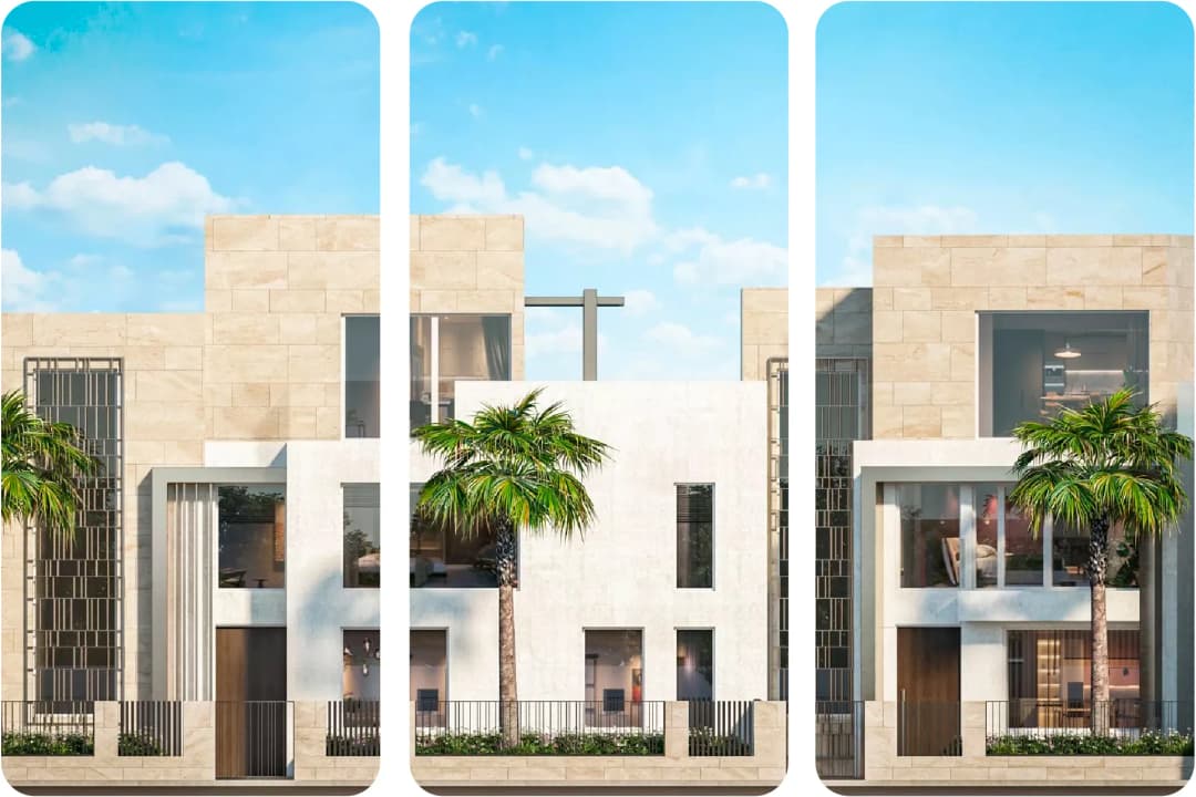 Emaar towers illuminated at dusk, showcasing modern architecture