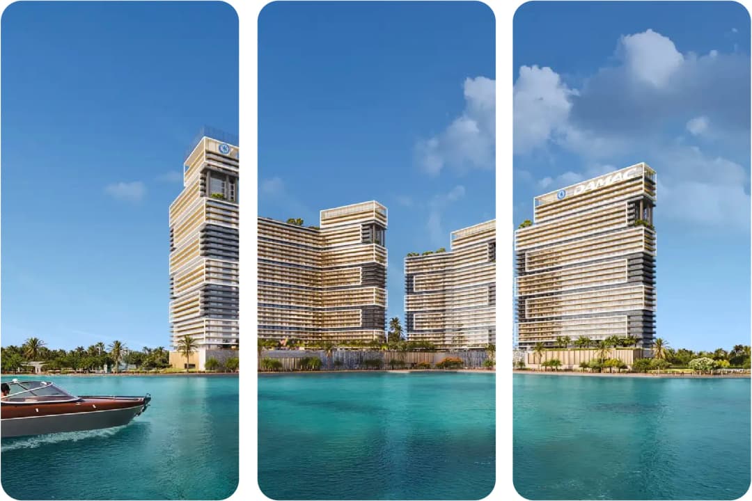 Twin towers illuminated at night with city skyline