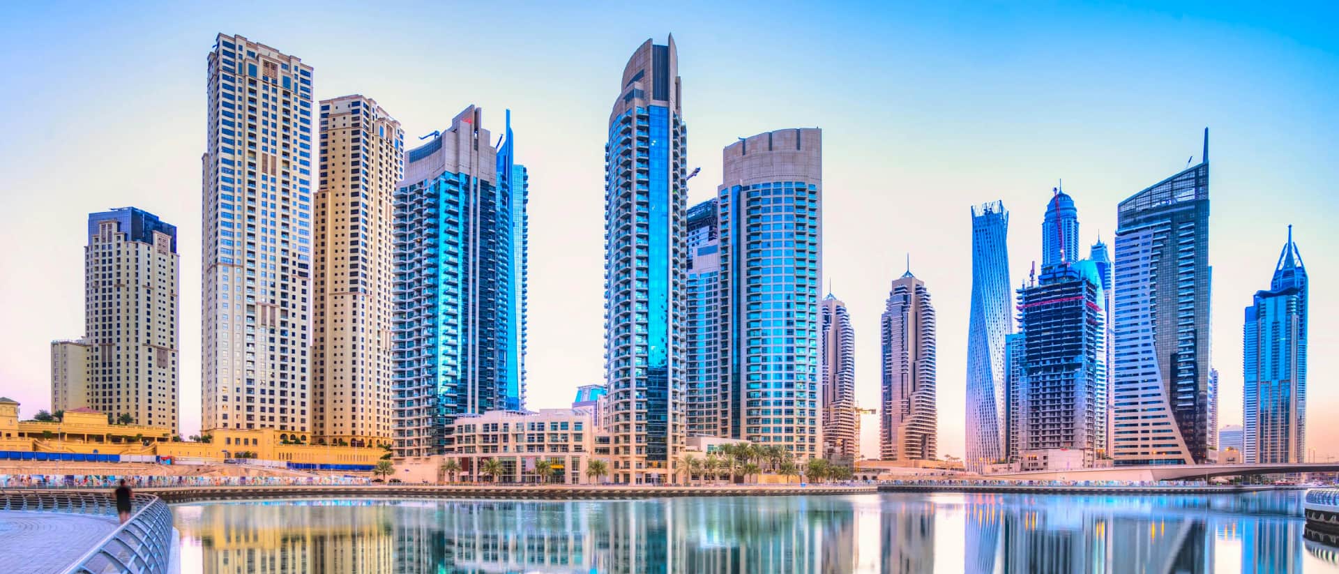 Modern skyscrapers line the waterfront in Dubai Marina