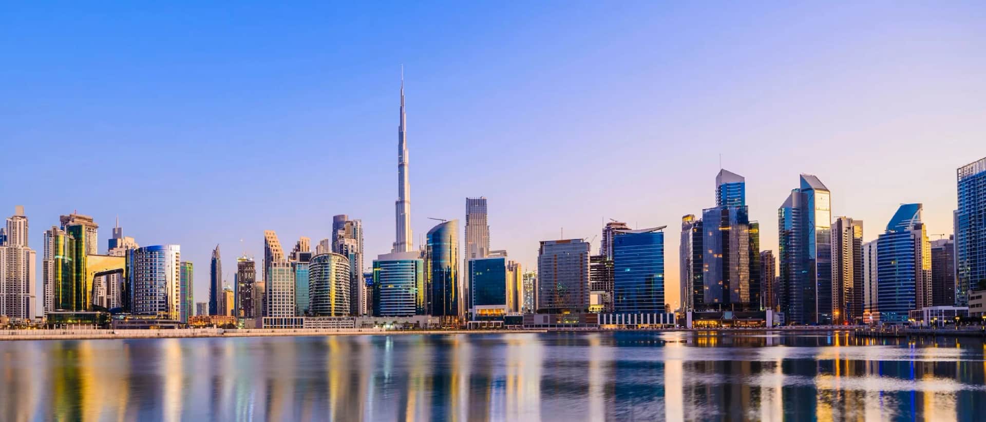 Dubai skyline with Burj Khalifa and buildings reflecting