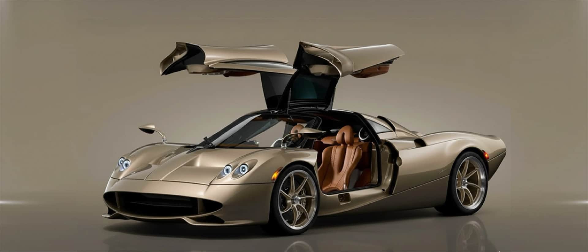 Pagani Huayra Roadster in gold, luxury car interior